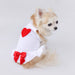 The image displays a dog wearing the Hello Doggie Puff Heart Dog Dress in white with a red heart and bow detail, sitting sideways