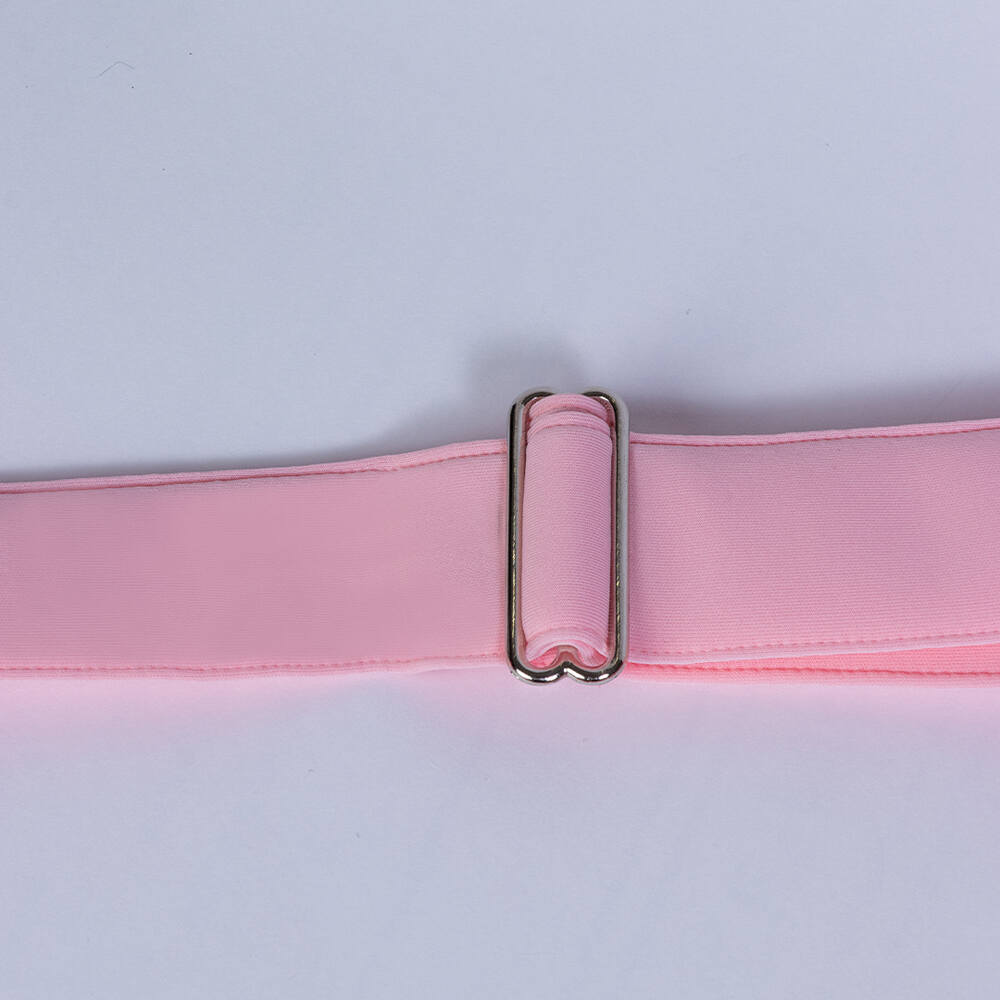 The image displays the adjustable strap of the Hello Doggie Signature Sling Dog Carrier in baby pink, offering a personalized carrying experience