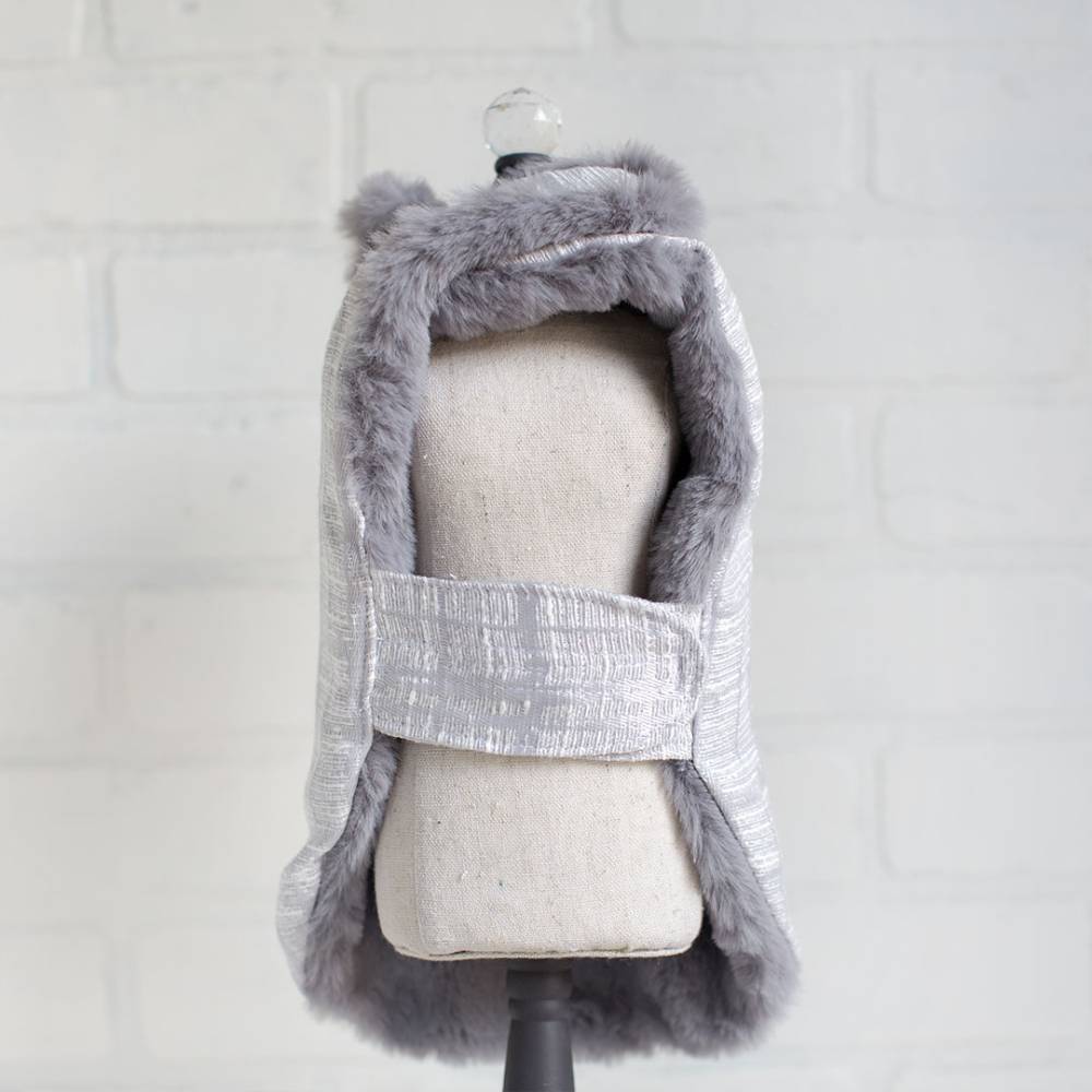 The image displays the back of the silver gray Hello Doggie Gia Dog Coat with the coat fully opened to show its inner lining and fastening strap