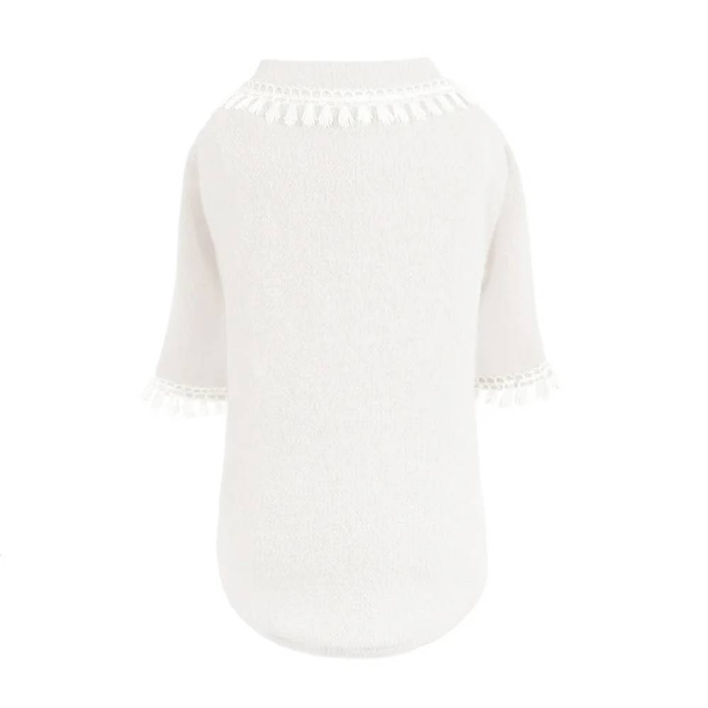The image displays the full view of a white sweater with a tassel fringe detail around the neckline and sleeve edges, titled Hello Doggie Heavenly Kiss Dog Sweater