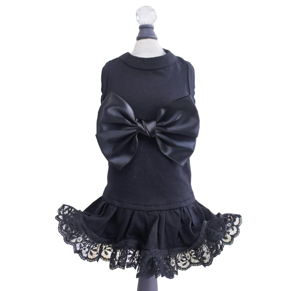 The image features a black Hello Doggie Ballerina Dog Dress adorned with a large bow and lace detailing on the skirt
