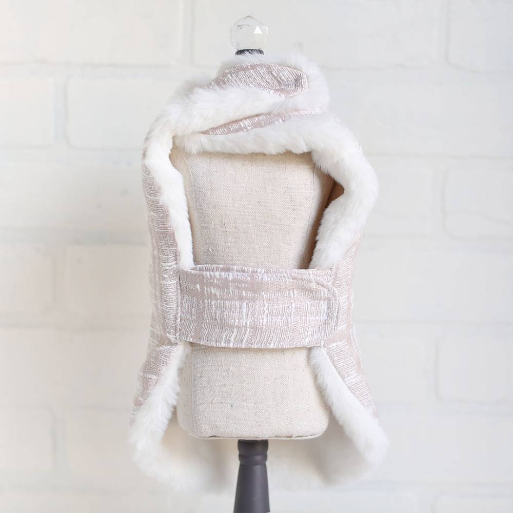 The image features a ice pink Hello Doggie Gia Dog Coat displaying its inner lining and secure strap, highlighting the coat's soft and warm interior