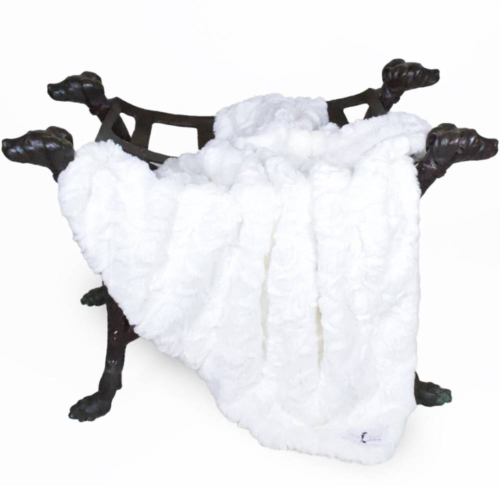 The image presents the Hello Doggie Bella Dog Blanket in vintage white, artfully positioned on a stand with dog-shaped legs