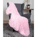 The image presents the pink-colored Hello Doggie Shag Throw Dog Blanket laid over a grey chair, showcasing its soft and furry texture