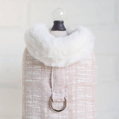 The image showcases a Hello Doggie Gia Dog Coat in a light ice pink color with a luxurious white faux fur collar