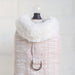 The image showcases a Hello Doggie Gia Dog Coat in a light ice pink color with a luxurious white faux fur collar