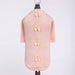 The image shows a Hello Doggie Dainty Bow Dog Sweater in peach with four pink bows aligned vertically down the back