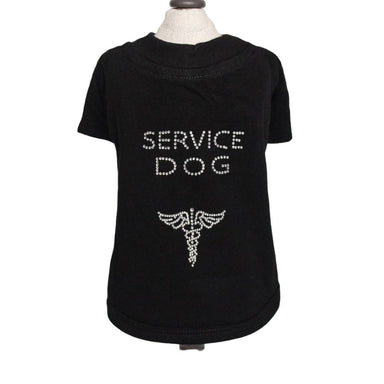 The image shows a black Hello Doggie Service Dog Tee featuring rhinestone-studded text that reads SERVICE DOG above a caduceus symbol