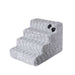 The image shows a set of gray, six-step Hello Doggie Luxury Pet Stairs with a bow decoration on the side
