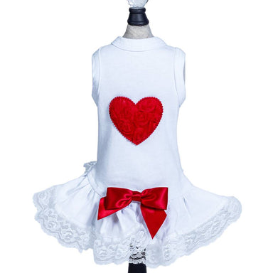 The image shows a white Hello Doggie Lacey Puff Heart Dog Dress with a red heart on the back and a red bow on the skirt