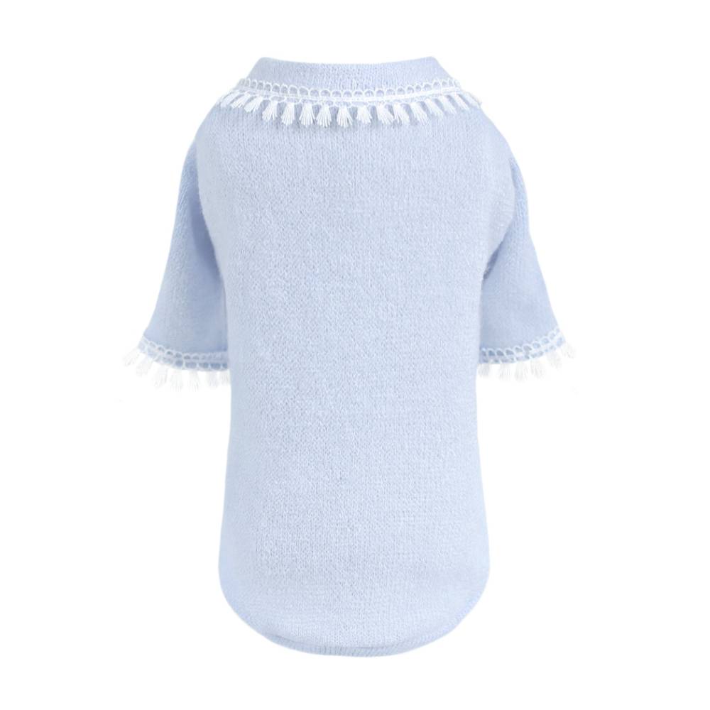 The image shows the back view of a blue sweater featuring a tassel fringe detail around the neckline and sleeve edges, referred to as Hello Doggie Heavenly Kiss Dog Sweater