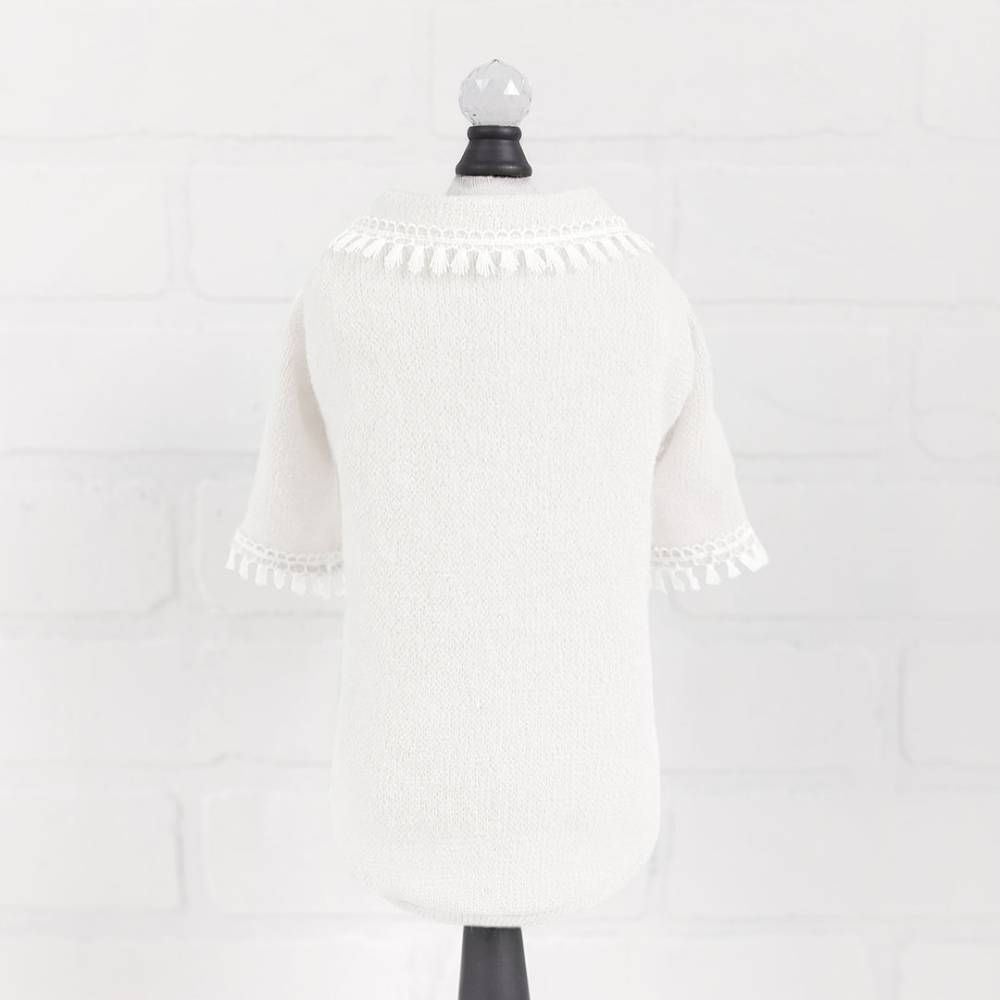 The image shows the back view of a cream sweater with a decorative tassel fringe around the neckline and sleeves, labeled as Hello Doggie Heavenly Kiss Dog Sweater