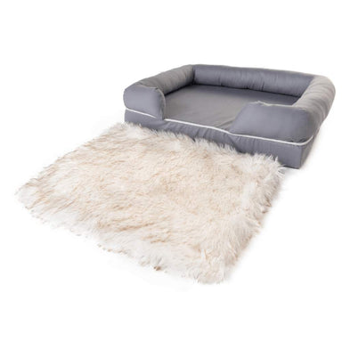 The image shows the detachable fur topper of the Paw PupLounge™ Memory Foam Bolster Dog Bed & Topper, illustrating its versatile and luxurious features