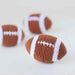 The image shows three brown crocheted footballs, each labeled as a Hello Doggie Crochet Football Dog Toy