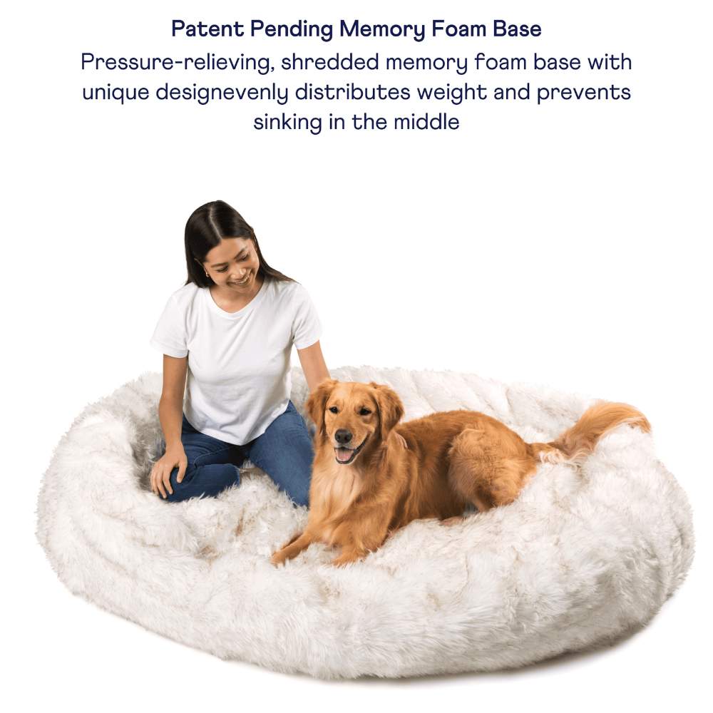 The pressure-relieving memory foam base of the White with Brown Accents Paw PupCloud™ Human-Size Faux Fur Memory Foam Dog Bed