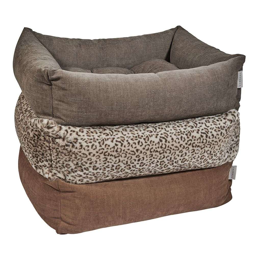 Three stacked versions of the Bowsers The Franklin Dog Bed are shown in gray, leopard print, and brown fabric