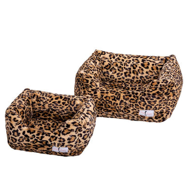 Two leopard-print Hello Doggie Cashmere Dog Beds placed side by side, featuring a bold pattern and soft, luxurious material