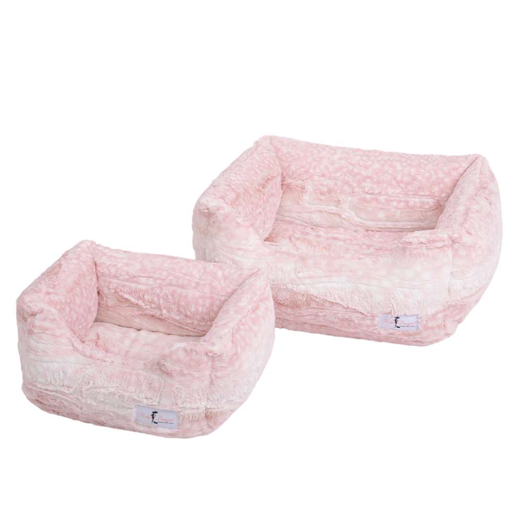 Two light pink Hello Doggie Cashmere Dog Beds placed side by side, highlighting their plush, fur-like texture and elegant design for cozy pet lounging