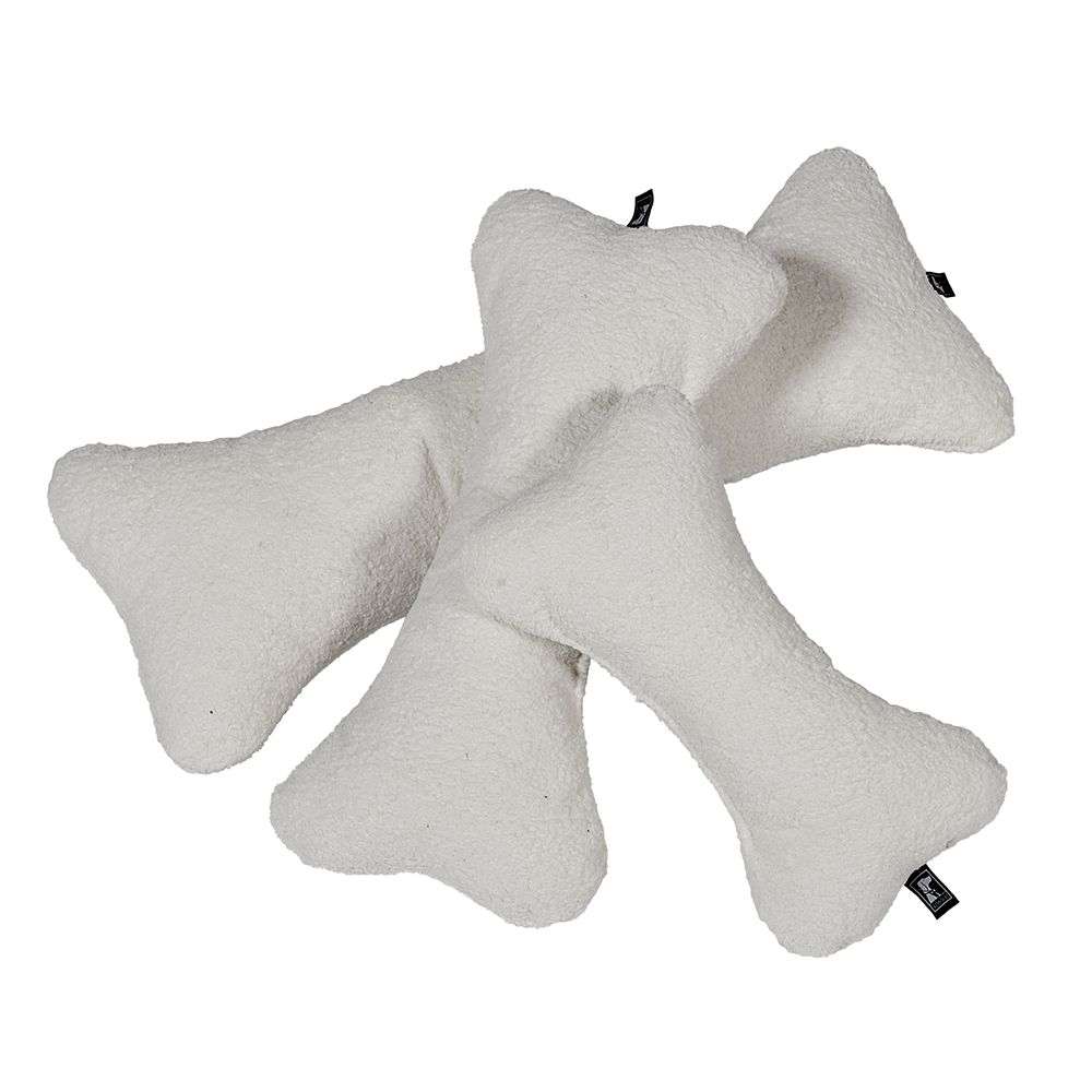 Vanilla Bowsers Bumper Bone Pillow creamy white plush bone dog toys stacked together with a soft fluffy texture