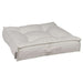 Vanilla Bowsers Piazza Dog Bed in creamy white plush fabric offers a soft tufted center with cozy raised edges