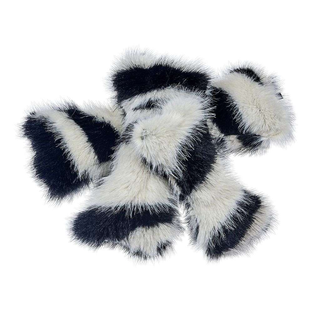 White Bengal Bowsers Bumper Bone Pillow fluffy black-and-white striped bone dog toys piled together on a plain background
