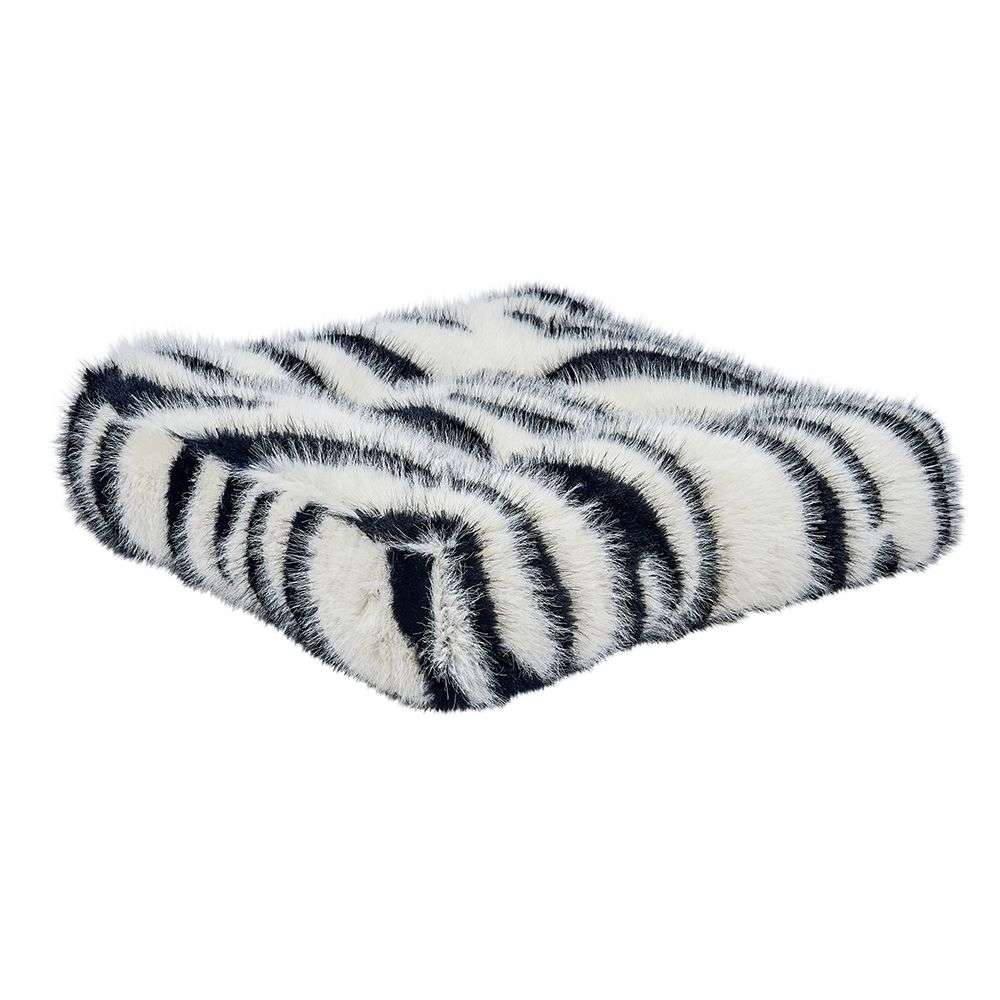 White Bengal Bowsers Piazza Dog Bed in black-and-white striped faux fur delivers a fluffy ultra-soft lounging space