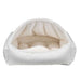 Winter White Bowsers Canopy Dog Bed in white features a plush arched canopy and soft cushioned base