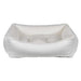 Winter White Bowsers One Of A Kind Scoop Dog Bed is a clean white bed with a soft plush interior and thick padded sides