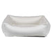 Winter White Bowsers Oslo Ortho Bed in soft white plush fabric with thick padded walls for a cozy dog sleeping space
