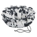 Wrangler Bowsers Buttercup Dog Bed featuring a black and white cow-print design with cozy raised bolsters and drawstring edges