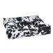 Wrangler Bowsers Piazza Dog Bed in black-and-white cowhide print fabric features a plush tufted design with supportive padded sides