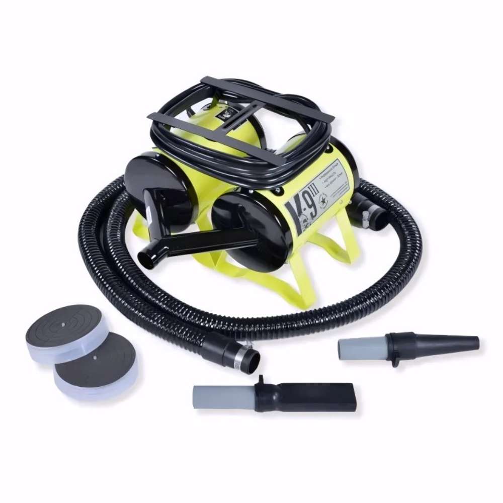 Yellow K-9 III Dog Dryer includes hoses, nozzle attachments, and removable filters arranged beside the dryer unit for pet grooming