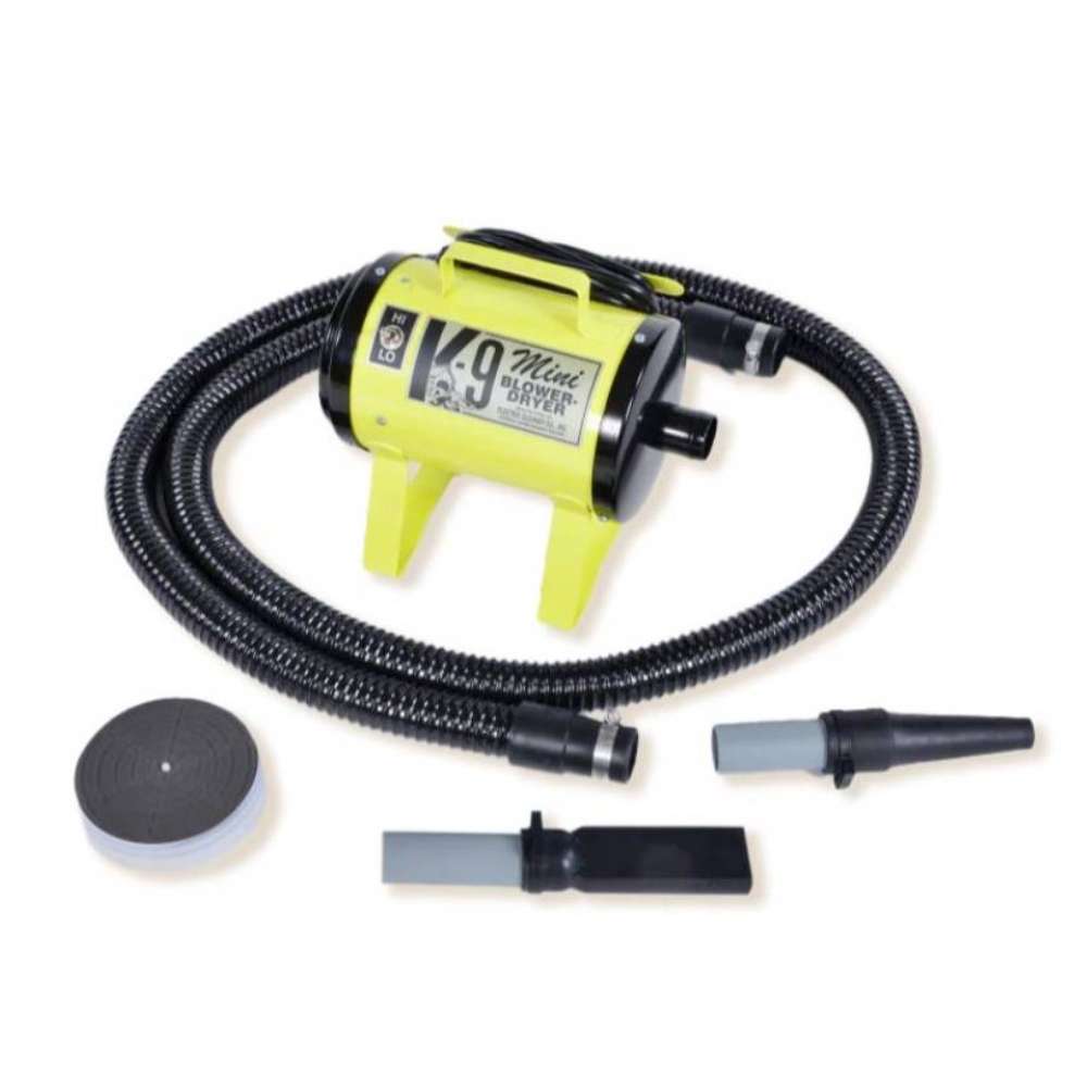 Yellow K-9 Mini Dog Dryer is a bright yellow portable pet dryer with a coiled hose and nozzle accessories for grooming pets